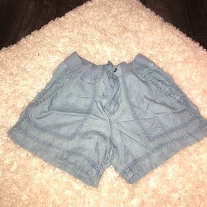 light blue shorts